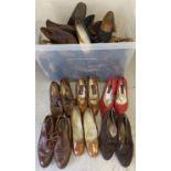 A large tub of assorted vintage women's shoes in brown tones, to include leather, suede and faux
