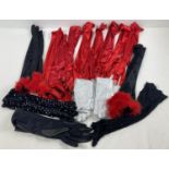 14 pairs of theatre costume long length gloves, in red, black & silver colours.