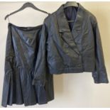 2 items of 1980's leather womens clothing. A black leather short style jacket with double button