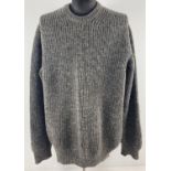 A men's chunky knit fisherman's style green fleck jumper by Barbour. Size L. Barbour label to neck