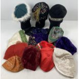 A quantity of assorted religious theatre costume hats and skull caps.