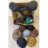 A box of assorted vintage and theatre brimmed felt hats. In varying colours and sizes.