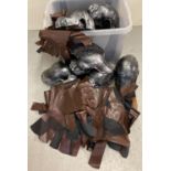 A box of theatre costume Roman Centurion helmets and accessories.