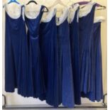 7 matching theatre costume fit and flare dresses in midnight blue velvet.