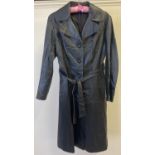 A vintage 1980's black leather full length coat with front button fastening, 2 front pockets and