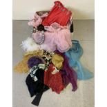 A box of assorted theatre costume accessories. To include headdresses, scarves, underskirt, bodice