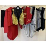 A collection of assorted circus and ringmaster theatre costume items.