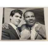 A 1967 black and white photograph of boxers Joe Bygraves and Eduardo Corletti taken by Disney for