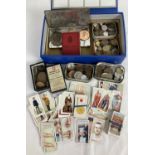 A box of vintage British & foreign coins, a small collection of vintage cigarette cards & 3 fun