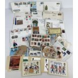 A quantity of assorted vintage loose stamps, first day covers and PHQ cards.