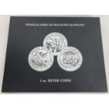 A Somalian African Wildlife Elephant 1oz Silver Coin collectors case with magnetic closure. Interior