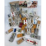 A large quantity of assorted vintage tea and cigarette cards. Together with assorted cigarette