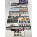 13 assorted Royal Mail mint stamp presentation packs. To include: Roses, Sherlock Holmes, Studio