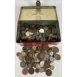A vintage Blue Bird Toffee tin containing a collection of antique & vintage British & foreign coins.