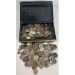 A vintage tin containing a collection of British and foreign antique & vintage coins in varying