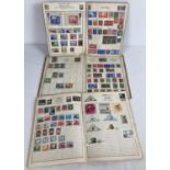 3 vintage stamp albums containing a collection of British and world stamps mostly in used condition.