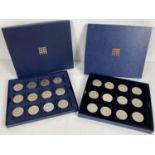 2 x Westminster Mint collectors coin boxes containing a a total of 24 commemorative crowns. To