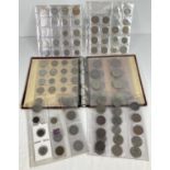 A coin collector folder containing a quantity of vintage British & foreign coins and British