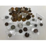 A collection of assorted vintage & antique British and foreign coins. To include: silver