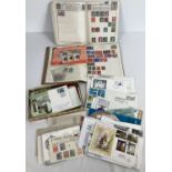 2 small vintage stamp albums containing used British and world stamps together with a collection