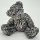 A filled sterling silver 1994 Theodore bear figurine by Country Artists. Silver mark and makers