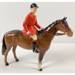 A Beswick ceramic Huntsman and horse figurine #1501, in brown gloss. Issued from 1957 - 95 and