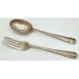 An early 20th century child's silver fork and rat tail spoon set. Both hallmarked to reverse of