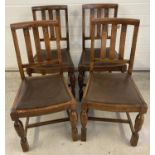 A set of 4 dark oak early 20th century dining chairs with slatted backs, carved detail & acorn