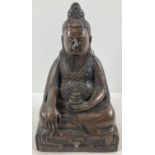 A large Chinese hollow bronze figure of seated Buddha. Approx. 29cm tall.