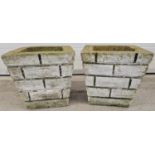 2 vintage concrete square shaped garden planters with brick effect detail. Each approx. 32cm tall