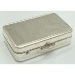 A small modern 925 silver pill box with hinged lid and push opening clasp. Approx. 4.5cm x 3cm.