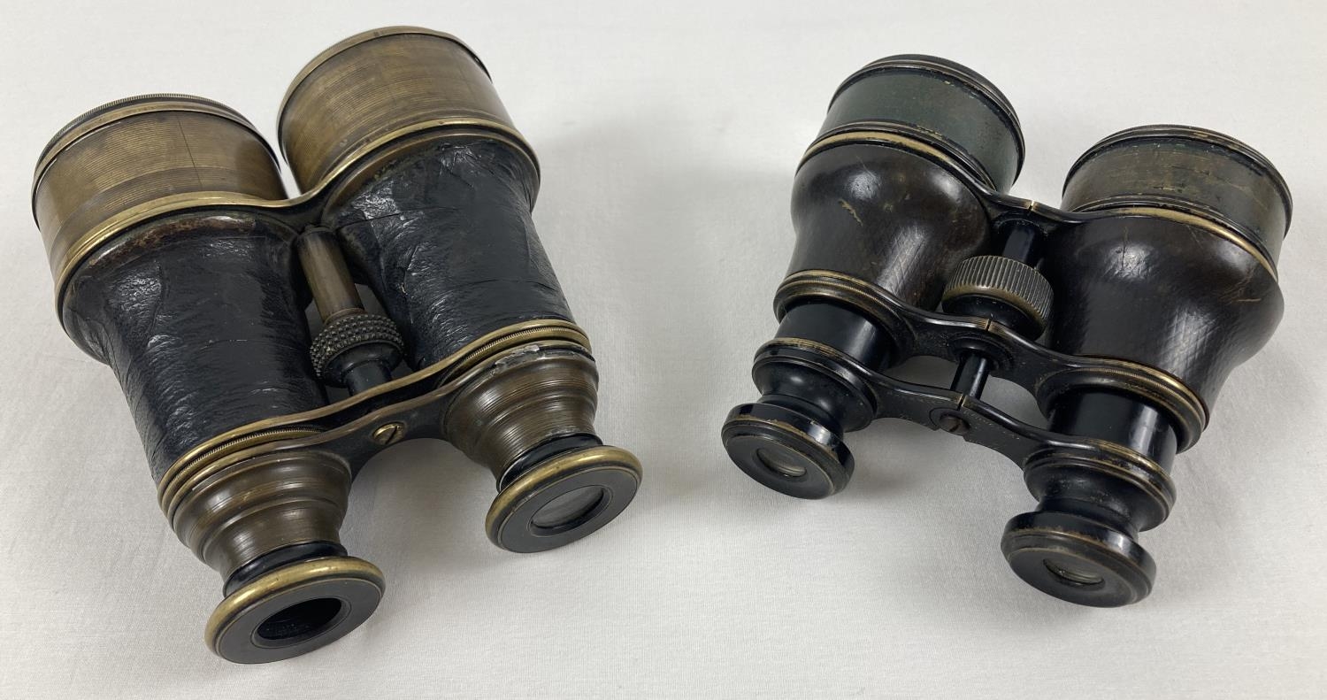 2 pairs of antique brass and leather bound binoculars to include a pair of John Browning