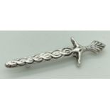 A vintage silver sword shaped brooch with Celtic design to front. Hallmarked for Sydney & Co,