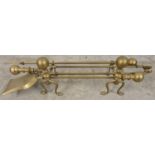 A set of vintage brass fire irons with matching fire dogs. Comprising: poker, shovel and tongs,