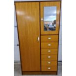 A mid century solid wood gentleman's wardrobe in light & medium wood finish. With period metal