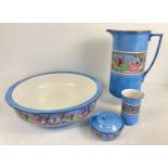 A vintage 5 piece ceramic bathroom set decorated with 18th century court scenes. Comprising: wash