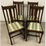 A set of 4 dark oak 1940's high backed turned legged dinning chairs. With re upholstered seats.
