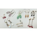 8 pairs of modern and vintage silver, white metal and costume jewellery drop style earrings. To