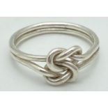 A silver double Lovers Knot dress ring. Marked 925 to inside of band. Ring size W. Approx 4.2g.