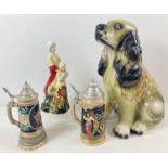 4 large ceramic items. A 16" vintage figurine of a Spaniel dog, 2 vintage lidded steins (one