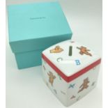 A boxed Tiffany & Co 2006 Alphabet Bears square ceramic money box. Approx. 8.5 cm tall.
