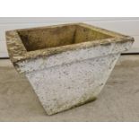 A concrete square shaped garden planter, approx. 30cm tall x 40.5cm wide.