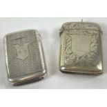 2 vintage silver plated vesta cases. A curved back vesta with scroll design engraving and empty