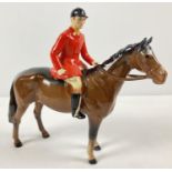 A Beswick ceramic Huntsman and horse figurine #1501, in brown gloss. Issued from 1957 - 95 and