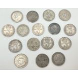 A collection of antique and vintage silver 3 pence coins. Sovereign heads of George V and VI.