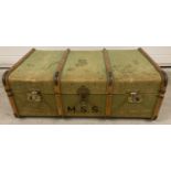 A vintage Boswell & Co, Oxford, canvas covered travelleing trunk. With light wood banding, leather