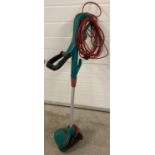 An electric Bosch Art26 Combitrim garden strimmer. Not tried & tested.