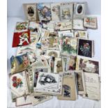 A box of assorted of Edwardian and vintage greetings cards.