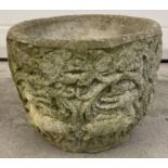 A vintage concrete garden planter decorated with carved bird and animal design. Approx. 24cm tall