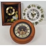 3 vintage Metamec quartz wall hanging clocks. 2 wooden cased clocks with floral detail together with